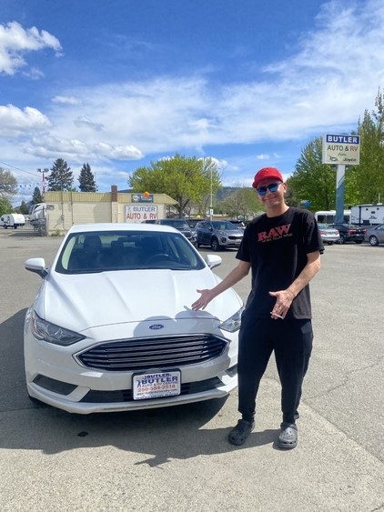  "Thank you, Ian, for your purchase of 2018 Ford Fusion from Butler Auto & RV! We are happy that we could help find the perfect vehicle for you"   Ian is 44 and this is his first self-owned car and you can see that excitement in this picture.